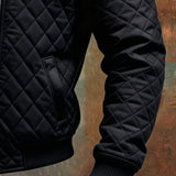 Ramiro - Sort quilted jakke med læder skuldre